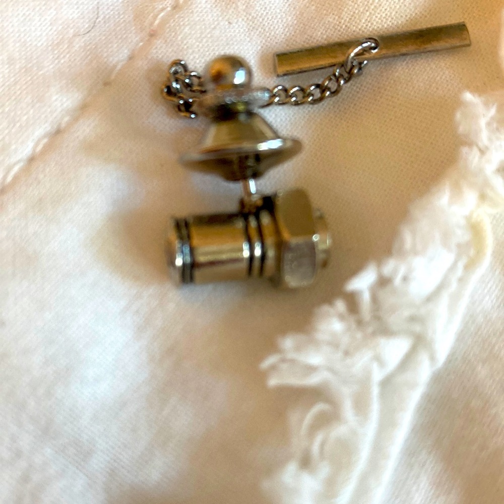 Chrome nut and bolt motif tie tac pin. Perfect like new.